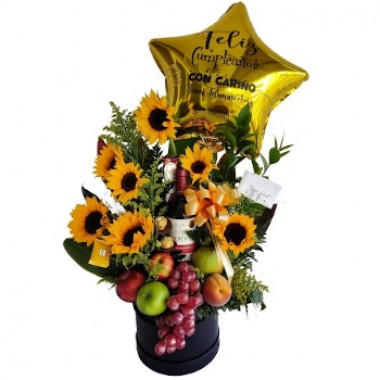 Girasoles, frutas, vino y chocolates