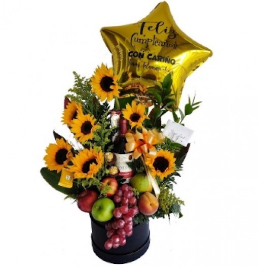 Girasoles, frutas, vino y chocolates